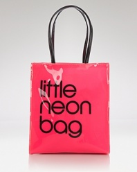 Charge it! This season we've updated our signature shopping bag in an electric hue. It's a bright little statement.