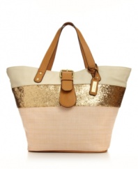 Get your glam on with this shimmering look from XOXO. A glitter detailed tote featuring polished gold-tone hardware and summer-ready straw exterior.