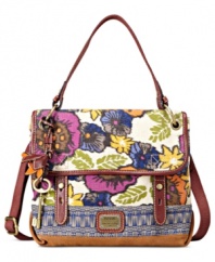 Give your modern look a little vintage feel with this colorful canvas carryall from Fossil. Decked out in signature brass-tone hardware, rich Italian leather and exquisite detail stitching--no wonder it's the silhouette of the season.