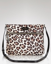 Hit print with this spot-splashed bag from kate spade new york. Designed in a slim profile with an adjustable strap for dramatic day-to-evening style, it's wildly wearable.