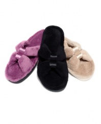 Add a romantic touch to your morning routine with plush, micro terry slide slippers by Isotoner.