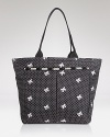 LeSportsac's signature nylon tote keeps essentials tied up with flirty white bows--let it carry you from workdays to weekends with feminine attitude.