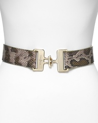 Add an exotic tough to every look with this python-embossed belt from Cole Haan. This style features elastic stretch -- wear it over chunky knits or to enliven a basic day dress.