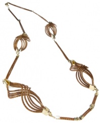 Through the use of indigenous fiber materials like buri and organic golden grass, found only in Brasil, Art da Terra creates handcrafted costume and fashion jewelry and handbags. The technique of intertwining golden grass, natural fibers and textiles into intricate designs by hand adds distinctive character to Art da Terra's creations. Own a piece of Brasil with this twist detail necklace made from golden straw found in the Amazon. Discover Brasil. The bold colors. The exotic scents. The sensual textures. The natural sensations. Only at Macy's.