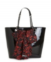 All wrapped up with a pretty bow: this basic yet bold shopper from DKNY is embellished with a flouncy silk star scarf that's removable in case it gets chilly.