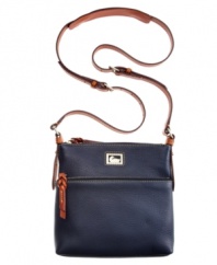 For elegance on-the-move, this Dooney & Bourke letter carrier design delivers. Beautifully textured grain leather and polished custom hardware lend a luxe look, while convenient crossbody strap keeps hands free while running from work to weekend and everywhere in between.