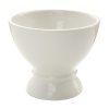 Clean lines and fluting details mark Villeroy & Boch's Farmhouse Touch collection, a nod to classic country style. This small vase is perfect for nestling votives or as a tabletop accessory.