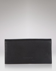 A classic bifold wallet in pebbled leather from Longchamp.