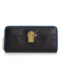 Feel perfectly pulled together with this ultra-organized wallet from Juicy Couture. Posh, golden keylock is poised against the JC and crown embossed leather, while well-organized interior compartments keep cash, cards and lip gloss in place.