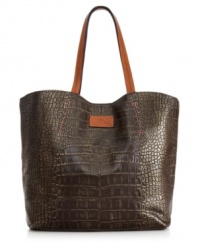 Like the gorgeous seaside city of its namesake, this croc-embossed Italian leather tote will escort you on any destination in style.  The classic design features antique brass hardware and  handcrafted stitching that lend a vintage feel, while pockets and compartments offer perfect organization within.