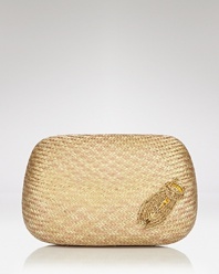 KOTUR proves mini bags can make a major statement with this woven straw clutch. Fusing shape and texture, it's a natural way to update every evening look.