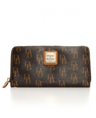 Think retro. the 1975 signature Dooney & Bourke ziparound wallet secures your financial essentials in vintage style.