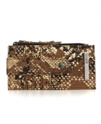 An eye-catching design from Kenneth Cole Reaction, featuring a fun python print and sleek metallic accents. This essential credit card holder gives you no-fuss instant access to cards and cash.