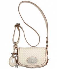 Fossil's Maddox flap bag, in woven leather, is simply stunning with its vintage-inspired details. This conveniently compact style is perfect for whisking around town all day, or for a chic concert-night style.
