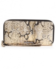 An eye-catching design from Kenneth Cole Reaction, featuring a fun python print and sleek metallic accents. An easy-access zip-around closure and convenient wristlet strap add function to this fashion-loving design.