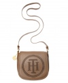 A laid-back look gets a standing ovation. This pebble leather crossbody from Tommy Hilfiger is accented with an eye-catching logo design and glam golden hardware, making it the perfect companion for running errands around town or relaxed weekends away.