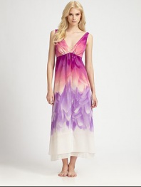 An ombre print of flower petals cascades down this lightweight feminine design of double-layered flowy chiffon. V-neckFront ruchingSleevelessV-backAbout 52 from shoulder to hemPolyesterMachine washImported