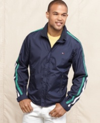 Improve your look off the tee with this striped golf windbreaker from Tommy Hilfiger.