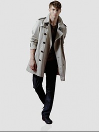Sleek and sophisticated rain trench, designed in signature lightweight cotton with removable wool liner.ButtonfrontDouble breastedShoulder epaulettesSide slash pocketsRear ventAbout 27 from shoulder to hemFully linedCottonDry cleanImported