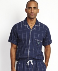 Top off your classic Sunday morning style with this short-sleeved windowpane camp shirt from Nautica.
