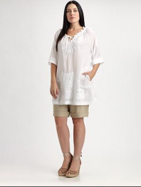 If you're looking for shorts with a relaxed fit, look no further than this linen style with classic front pleats and sporty, drawstring ties. Hook-and-eye closureDrawstring detailCord endsFront pleats and slash pocketsCuffed hemBack waist darts and welt pocketsInseam, about 8LinenMachine washImported