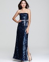 In shimmering, inky sequins, BCBGMAXAZRIA's sparkling dress lends a dazzling look to the evening's events.