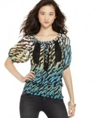 Spruce up your casual wear with this print from Sequin Hearts. The inset lace makes top really pop!