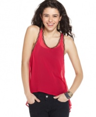 Flaunt your tank love this season with a chiffon variation that boasts fun, braided trims and a trend-forward asymmetrical design! From Lily White.