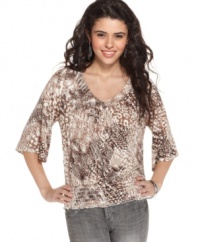 Mixed animal print makes this blouson top from American Rag a vivacious pick. Style it with metallic accessories for a casual-cute look that suits your wild life!