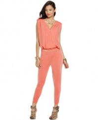 Tapered pants and a blouson top strike the perfect balance on this jumpsuit from Baby Phat! Pair it with bold heels for a look that garners three snaps in z formation!