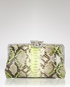 Embrace your exotic instincts with this genuine python clutch from Clara Kasavina. With a crystal embellished frame, this ultraluxe bag is the perfect partner for your finest jewels.