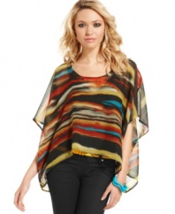 Painted in serene, Sahara-inspired colors -- and sporting a chic, asymmetrical design -- this caftan from Jessica Simpson is an easy, breezy style for balmy days.