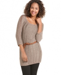 XOXO's open stitch sweater has a slim fit that highlights your waist. The tunic length is ideal for pairing with your fave jeggings!