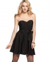 This little black dress from GUESS? takes sexy to the next level! Pair it with patent platforms and all eyes will be on you.