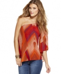 Bold print plus a stunning asymmetrical sleeve make this top from Jessica Simpson the one to beat! Rock it with a stack of fab accessories for a night look that's appropriately chic!