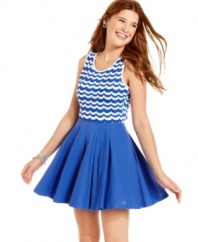 Make waves in this dream dress from Tommy Girl, where a top of scalloped print is anchored by a full and swingy skirt!