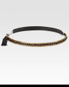 A two-sided style in supple leather and leather accented link chain, finished with a leather tassel. Width, about 1Imported 