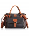 Ultra-feminine and undecidedly chic, this luxurious leather satchel from Dooney & Bourke will add a touch of elegance to any ensemble. Exquisite detail stitching and flirtatious tassel accents adorn the exterior, while several pockets and compartments provide exceptional organization within.