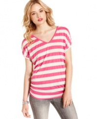 Born to lounge: stripes galore evoke easygoing style on this relaxed fit tee from Pink Rose that sports a fun, back cutout!