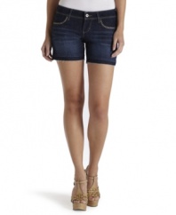 Studded pockets and a frayed hem elevate these dark wash shorts to ultra-cool heights! A hot weather must-have!