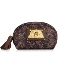Petite yet perfectly sized for all your makeup must-haves, this Juicy Couture cosmetic bag slips discretely into a purse or weekend bag so you stay glam wherever you go. It's dressed up with golden signature plaque, quilted pattern and fun tassel for extra allure.
