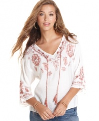 American Rag presents the ultimate in comfy-ccol with a caftan-style top adorned in swirling embroidery! Pair the piece with your fave skinny jeans for a casual weekend look that makes a global statement.
