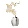 Nambé's Pod vase is a perfect modern accent for your home. A soft willowy silk orchid is included or choose a fresh bud from your garden.