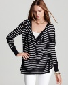 Master an effortlessly laid-back layered look in this MICHAEL Michael Kors striped sweater, designed with a deep cowl neckline and attached solid faux lining.