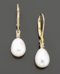 Cultured freshwater pearls (8x10 mm) and sparkling diamond accents combine for a truly elegant look. Set in 14k gold.