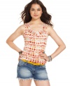 Fun print unites with a pleated neckline design on a casual top that suits your daytime playtime! From American Rag.