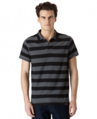 Bold bar stripes gives this polo shirt from Calvin Klein Jeans a strong, stylish look.