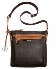 Make this monogram crossbody by Giani Bernini you're go-to bag for work, weekend and anything in between. Features front zip around pocket with plenty of compartments for stashing cash, cards and ID and a well-organized interior for all the rest.