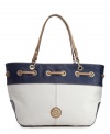 Anchors away! This nautical satchel from Anne Klein features an eye-catching woven detail at top, shiny goldtone hardware and a signature emblem at front.