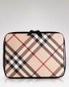 Carry your laptop in signature Burberry style with this checked padded sleeve.